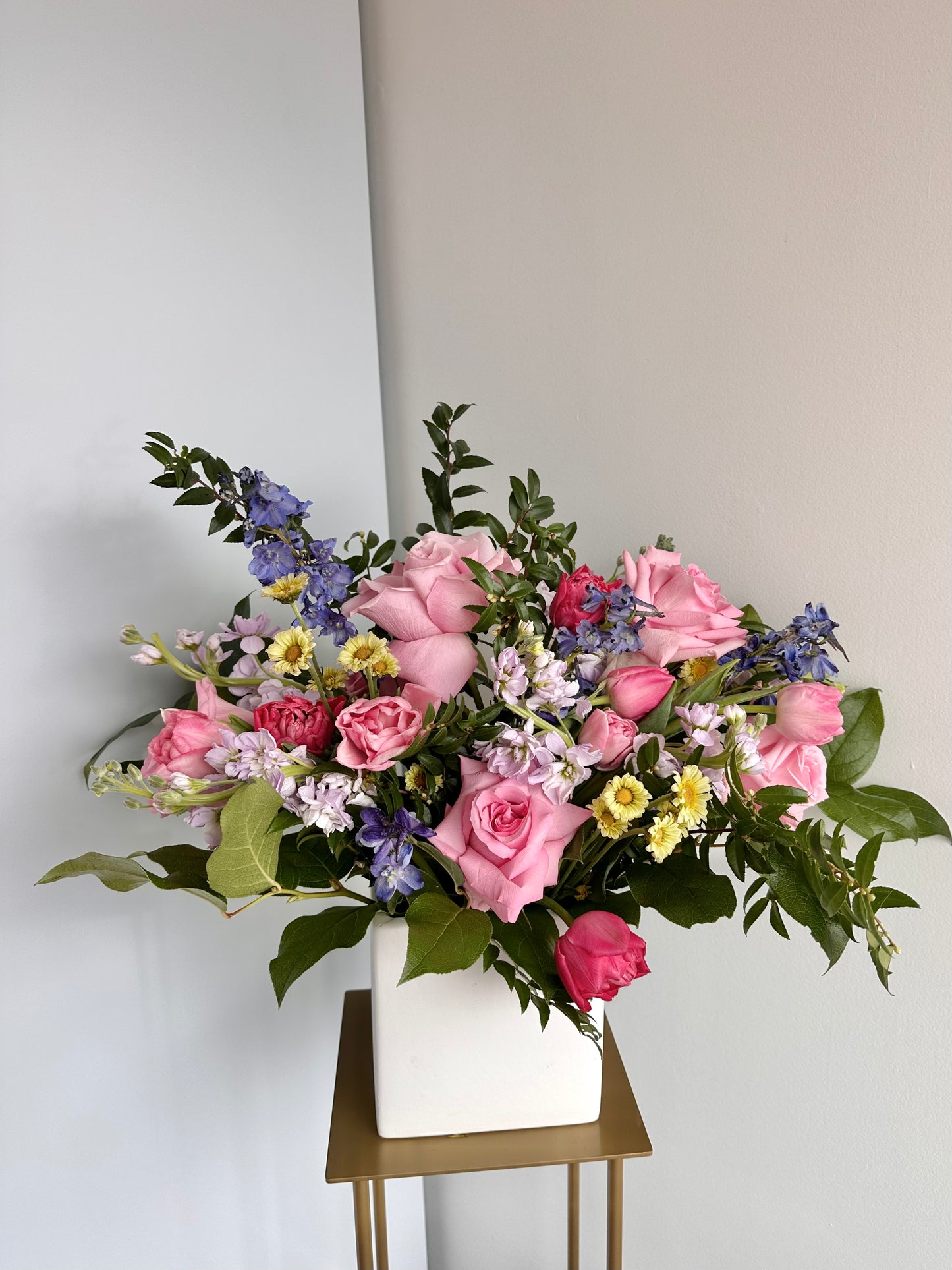 Grand floral arrangement featuring premium seasonal blooms, artfully designed in a neutral vase by Fonta Flora Flower Co. for an elegant, garden-inspired look.